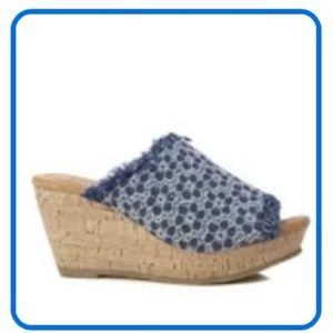 Wedge sandals by Minnetonka,  LOLA  733011 BLE.  Blue eyelet denim, size USA 9